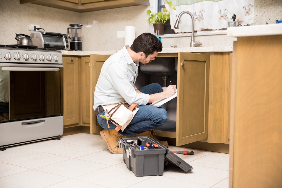handyman writing a work estimate